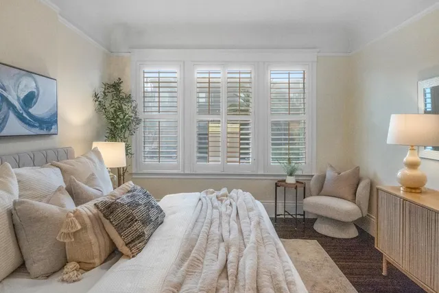 a bed room with a bed and a couch