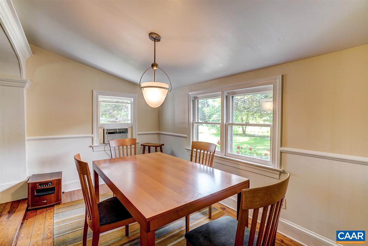 2262 Hamilton Road Louisa, VA 23093 - Photo 16 of 49 a view of a dining room with furniture window and wooden floor