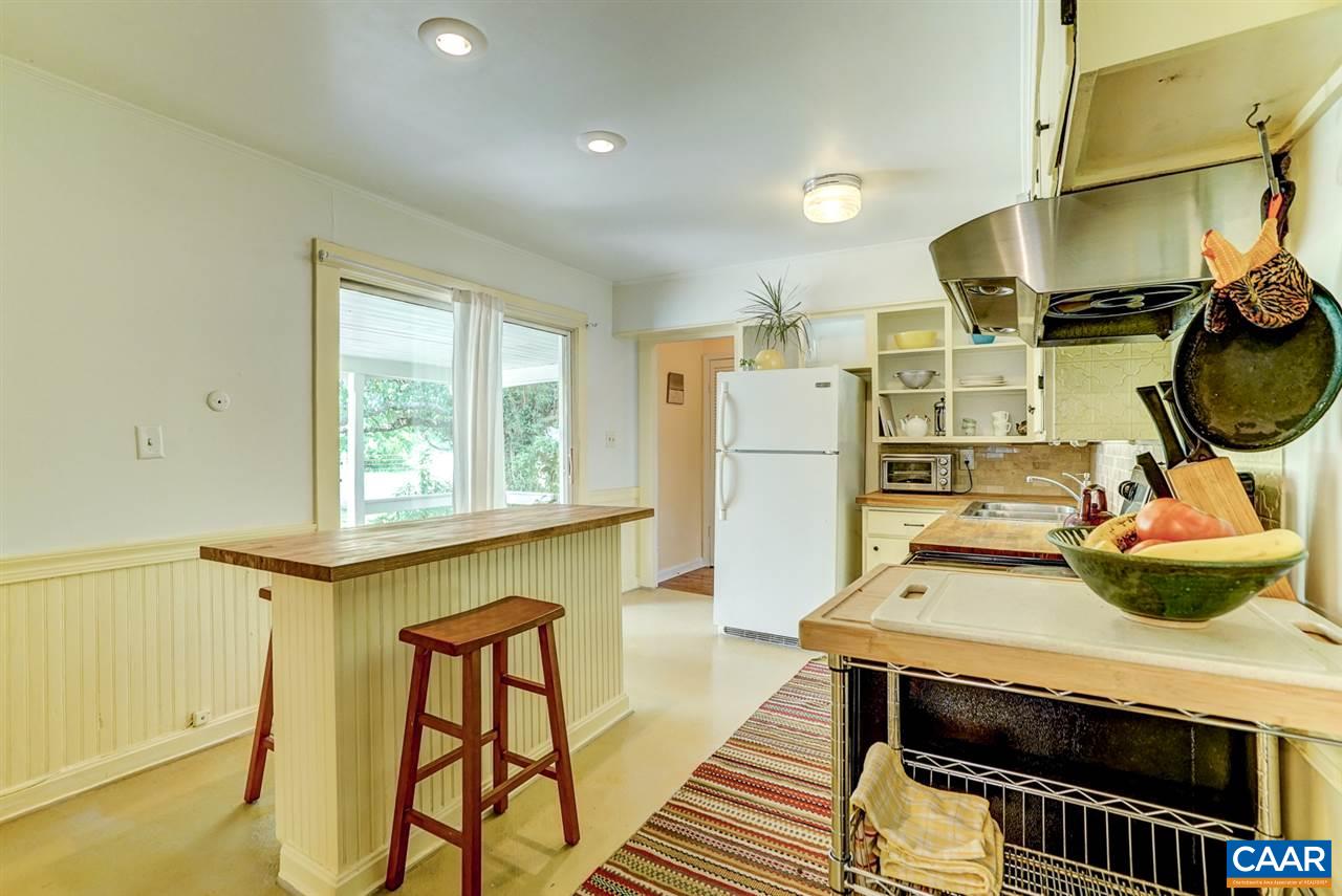 2262 Hamilton Road Louisa, VA 23093 - Photo 20 of 49 a kitchen with stainless steel appliances a stove a refrigerator and cabinets