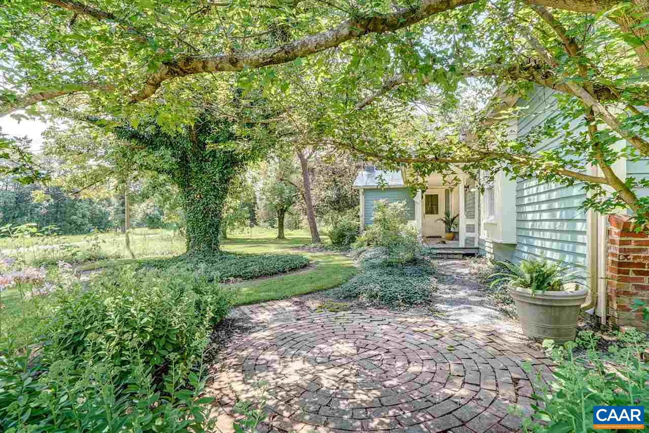 2262 Hamilton Road Louisa, VA 23093 - Photo 34 of 49 a view of a yard with plants and a trees