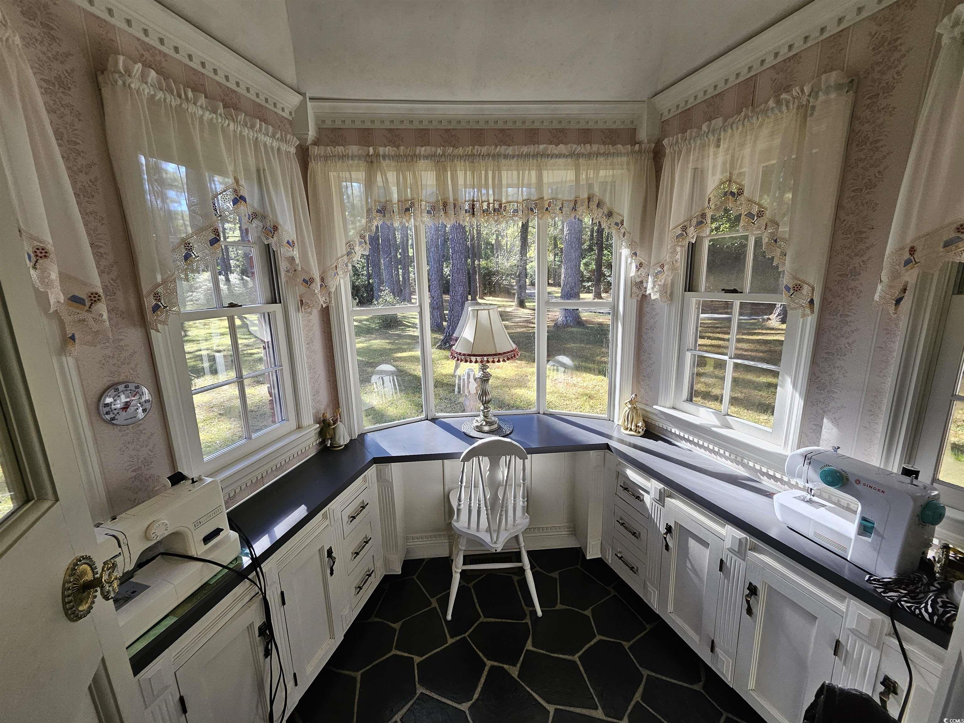 2840 Pennyroyal Road Georgetown, SC 29440 - Photo 30 of 36 Unfurnished sunroom featuring healthy amount of natural light and tile patterned floors