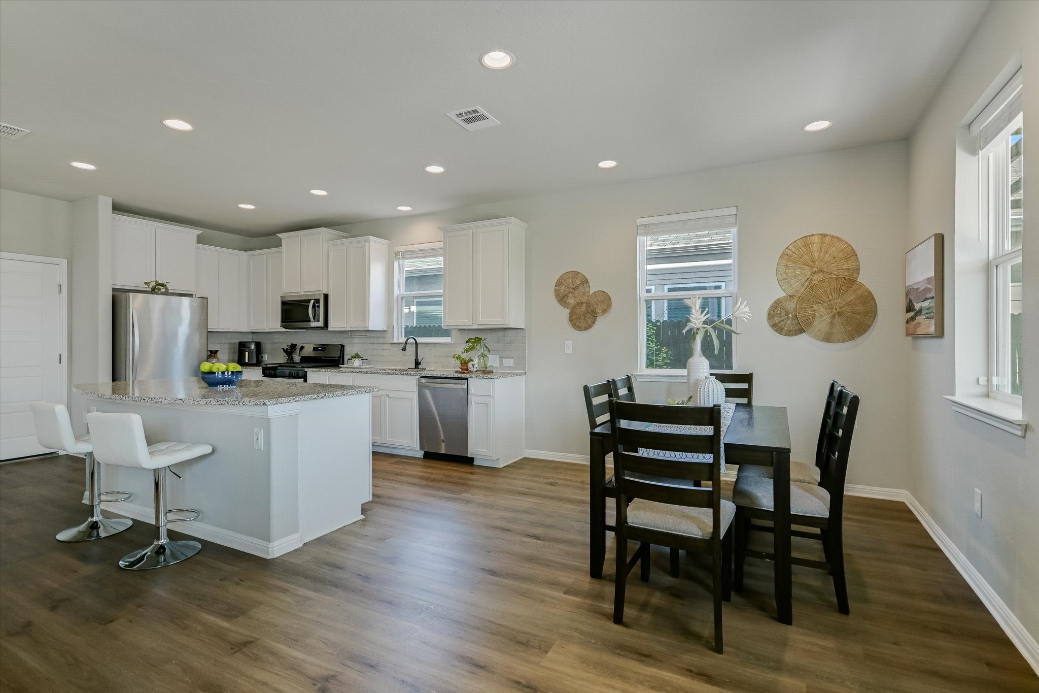 6304 Gunflint Drive Austin, TX 78747 - Photo 8 of 28 From weeknight dinners to weekend dinner parties, this space was made for gathering.