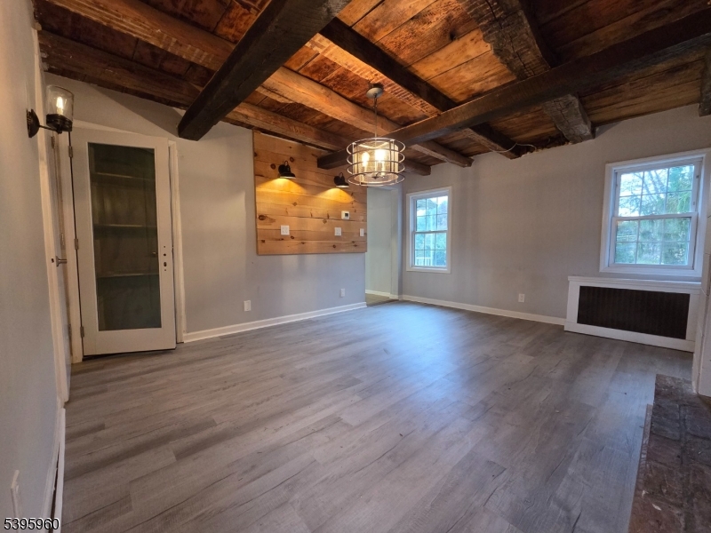 97 Fairmount Road West Califon, NJ 07830 - Photo 13 of 41 an empty room with wooden floor and windows