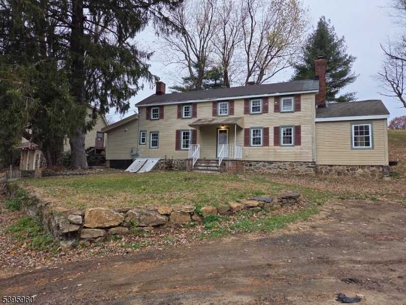 97 Fairmount Road West Califon, NJ 07830 - Photo 2 of 41 a front view of a house with a yard
