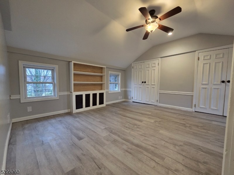 97 Fairmount Road West Califon, NJ 07830 - Photo 27 of 41 a view of an empty room with a window and wooden floor