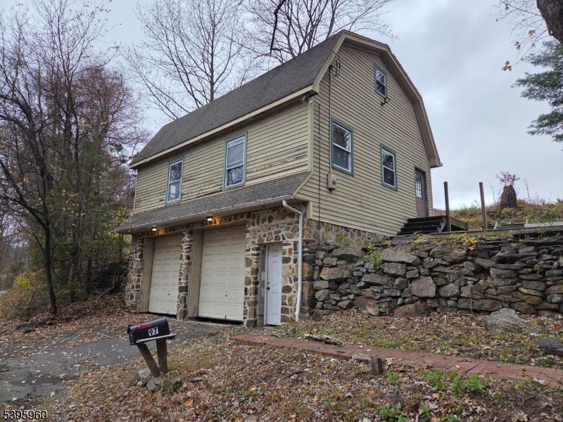 97 Fairmount Road West Califon, NJ 07830 - Photo 5 of 41 a backyard of a house with a large tree