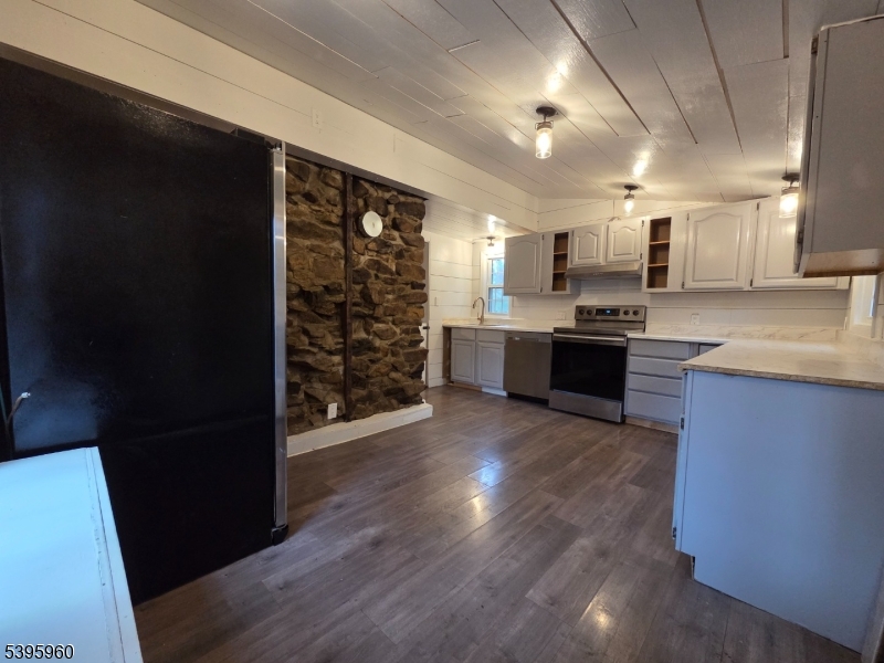 97 Fairmount Road West Califon, NJ 07830 - Photo 9 of 41 a kitchen with stainless steel appliances granite countertop a refrigerator and a sink