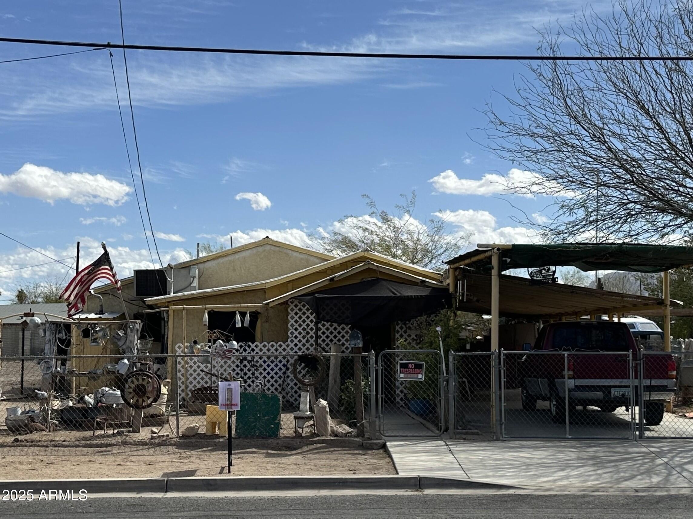 505 North D Street Eloy, AZ 85131 - Photo 1 of 25 a view of a house with a patio