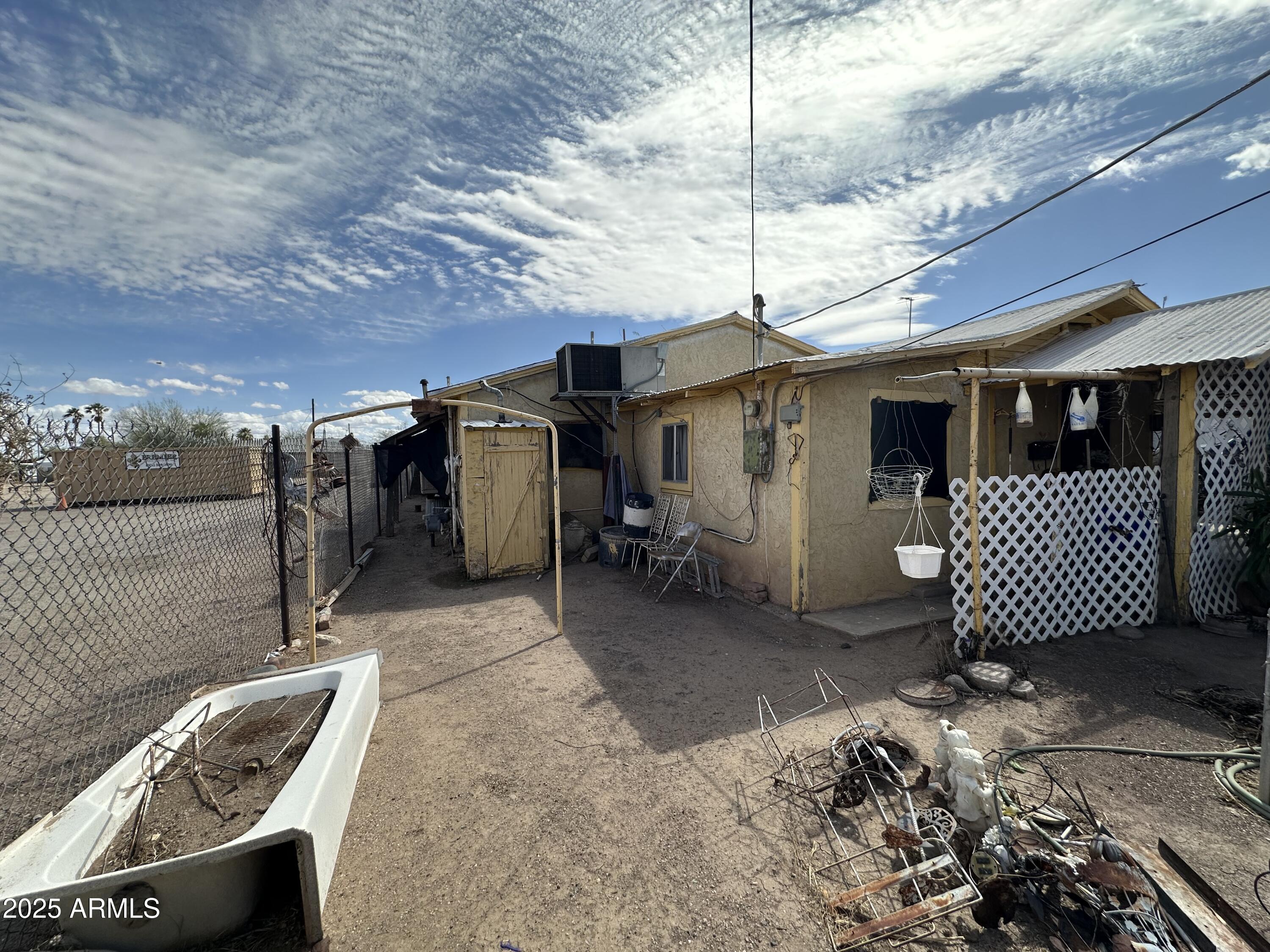 505 North D Street Eloy, AZ 85131 - Photo 2 of 25 a view of a patio with a table and chairs