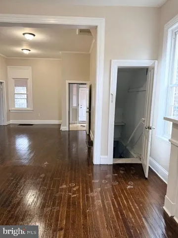 a view of entryway with wooden floor