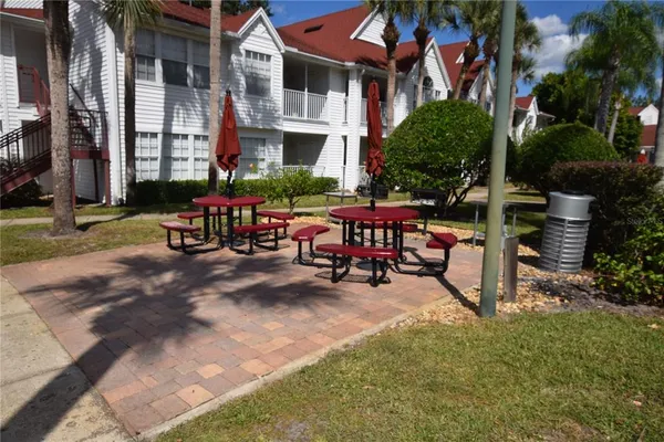 a view of a building with sitting area