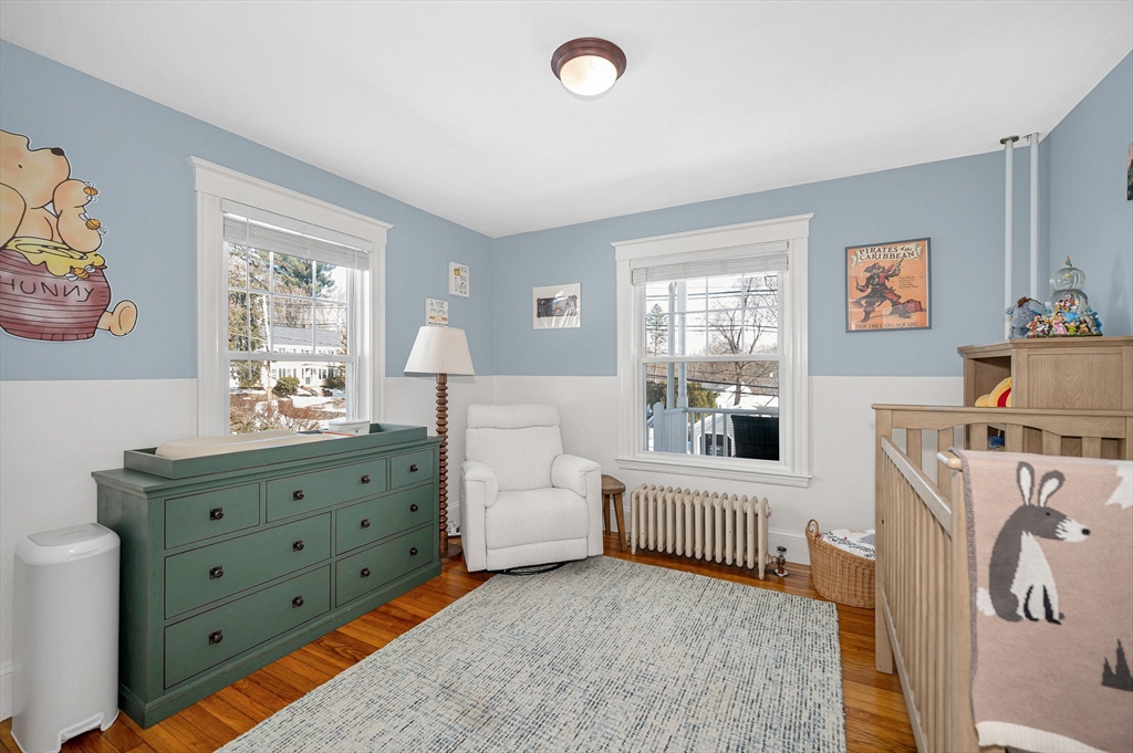 430 West Street Reading, MA 01867 - Photo 12 of 35 a bedroom with furniture and a window