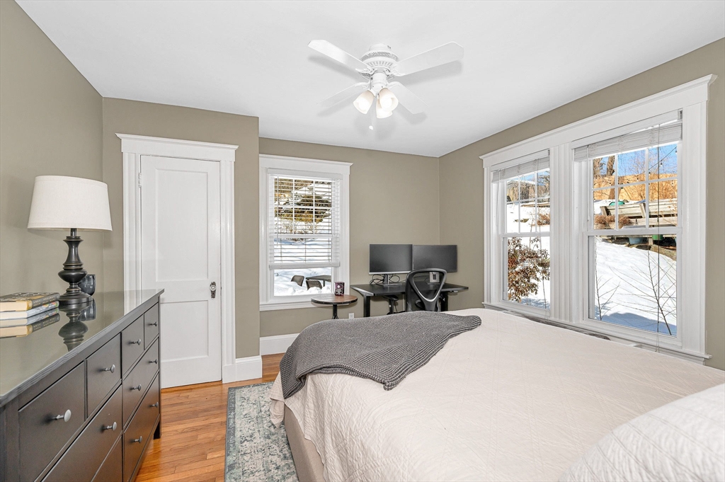 430 West Street Reading, MA 01867 - Photo 16 of 35 a bed room with a bed and a tv