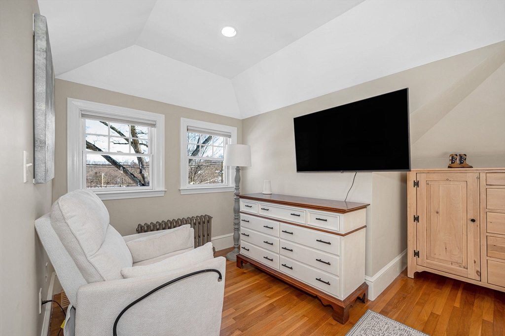 430 West Street Reading, MA 01867 - Photo 20 of 35 a living room with furniture and flat screen tv
