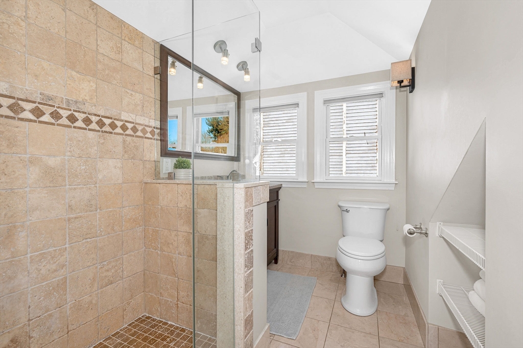430 West Street Reading, MA 01867 - Photo 22 of 35 a bathroom with a toilet sink and shower