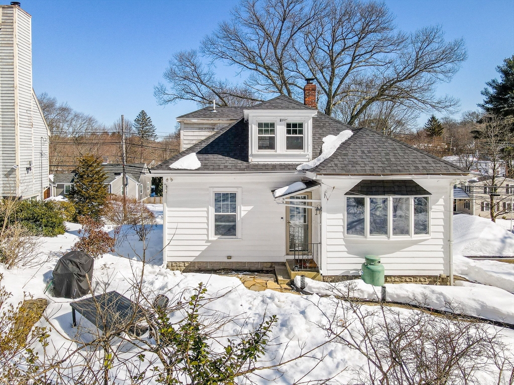 430 West Street Reading, MA 01867 - Photo 33 of 35 a front view of a house with a yard