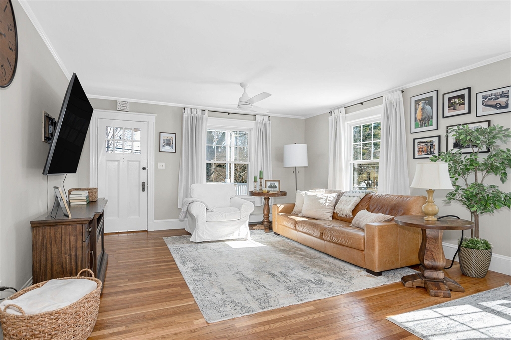 430 West Street Reading, MA 01867 - Photo 4 of 35 a living room with furniture and a flat screen tv