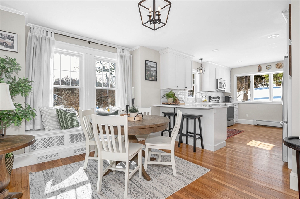 430 West Street Reading, MA 01867 - Photo 6 of 35 a view of a dining room with furniture window and wooden floor