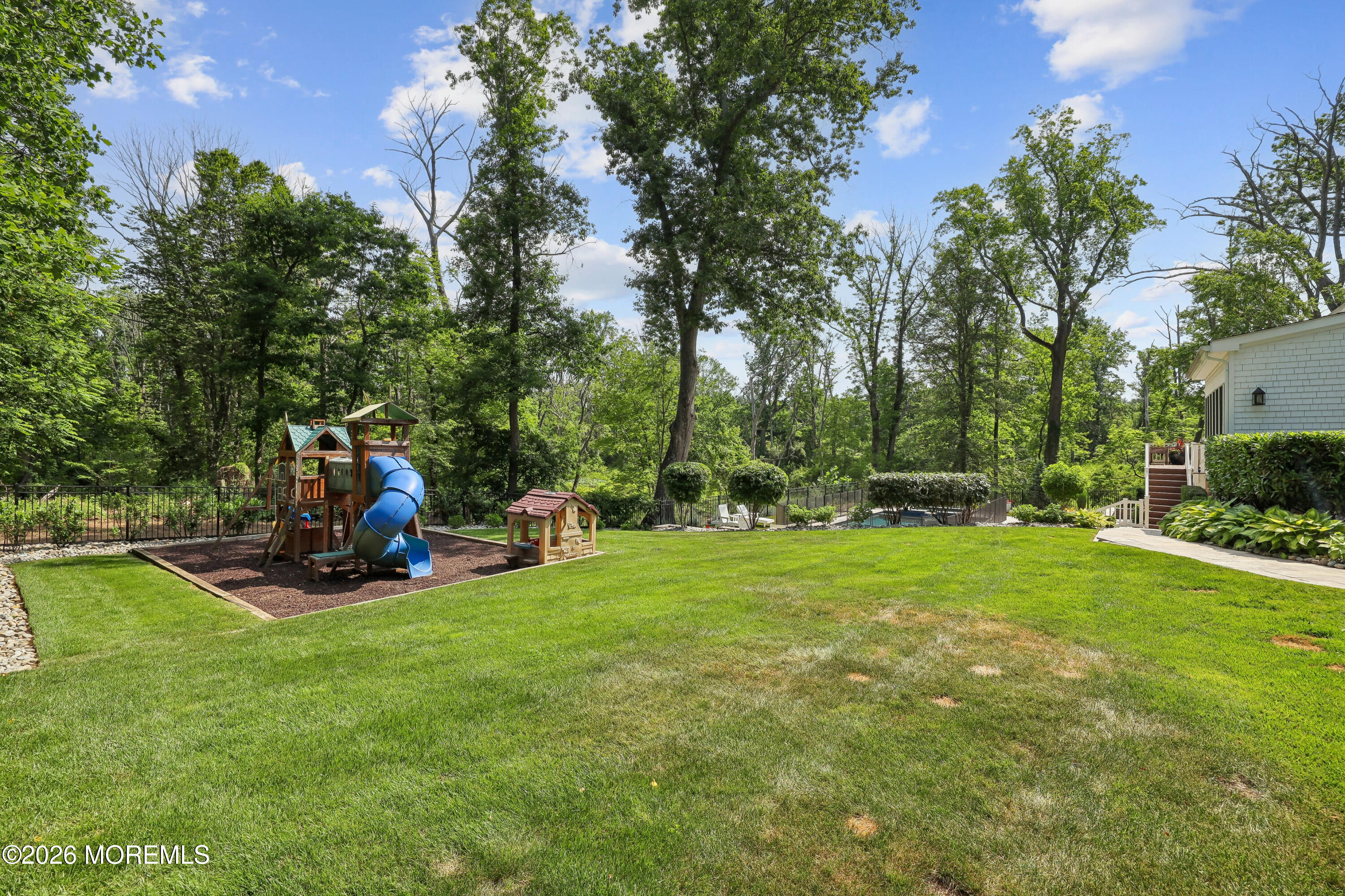 92 Tulip Lane Colts Neck, NJ 07722 - Photo 46 of 55 a view of a park with large trees