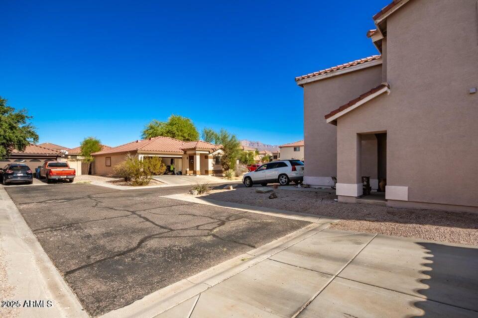 3436 South Chaparral Road Apache Junction, AZ 85119 - Photo 17 of 28 a view of a car park in front of a house