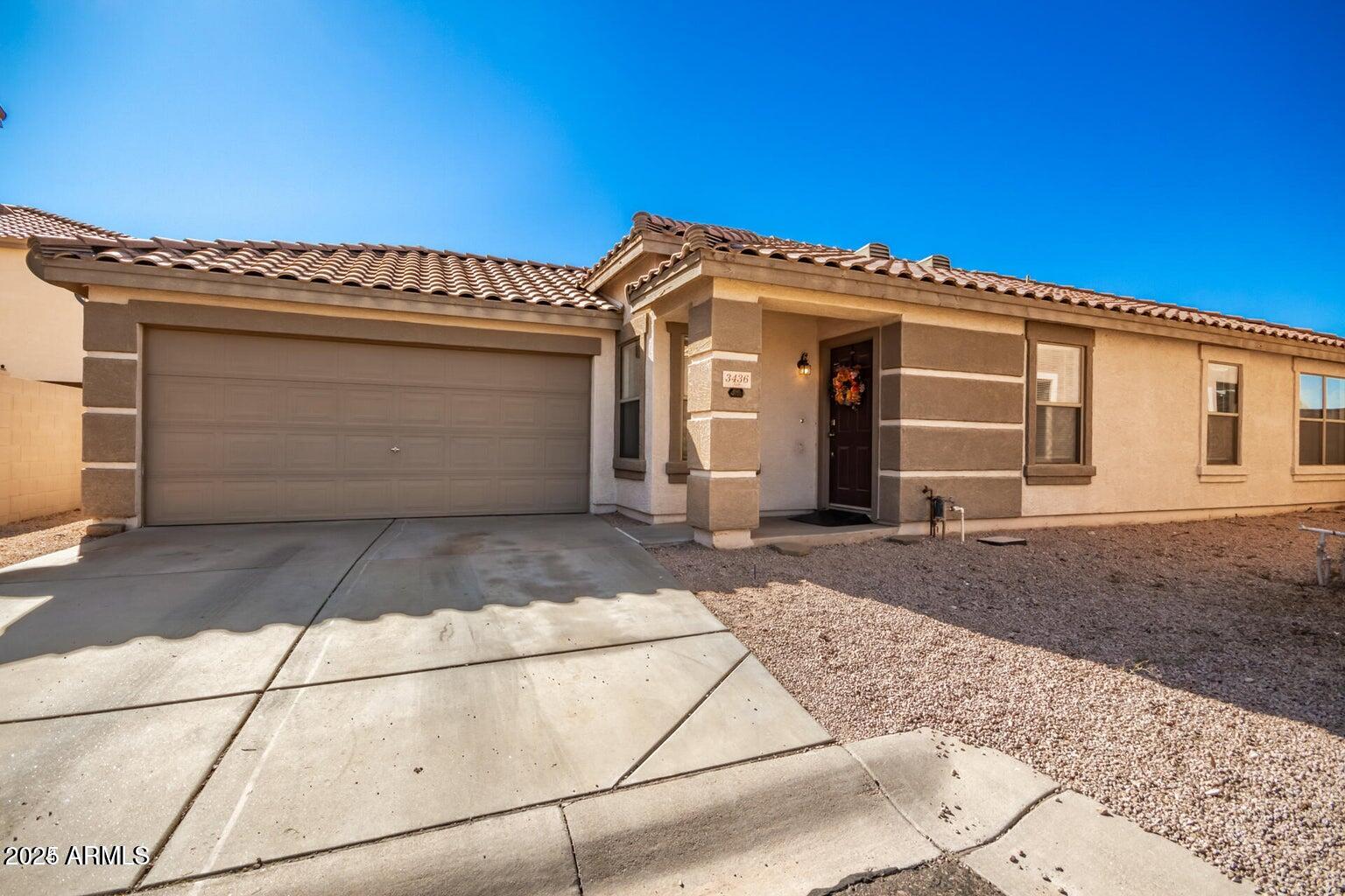 3436 South Chaparral Road Apache Junction, AZ 85119 - Photo 2 of 28 a front view of a house