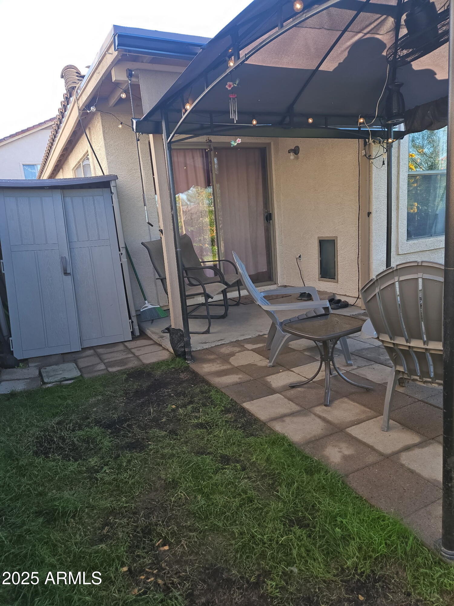 3436 South Chaparral Road Apache Junction, AZ 85119 - Photo 23 of 28 a view of a backyard with table and chairs