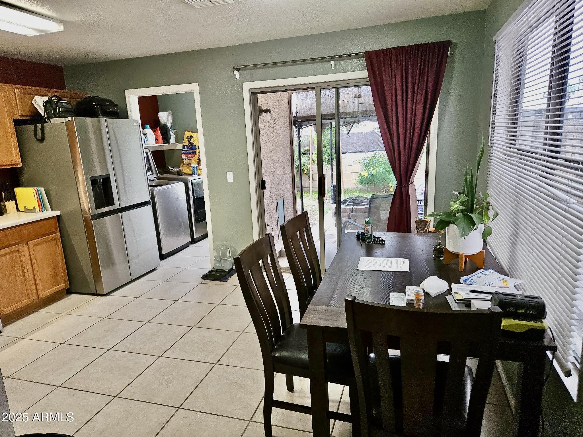 3436 South Chaparral Road Apache Junction, AZ 85119 - Photo 7 of 28 a view of a dining room with furniture window and outside view