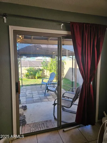 a work room with furniture and a window