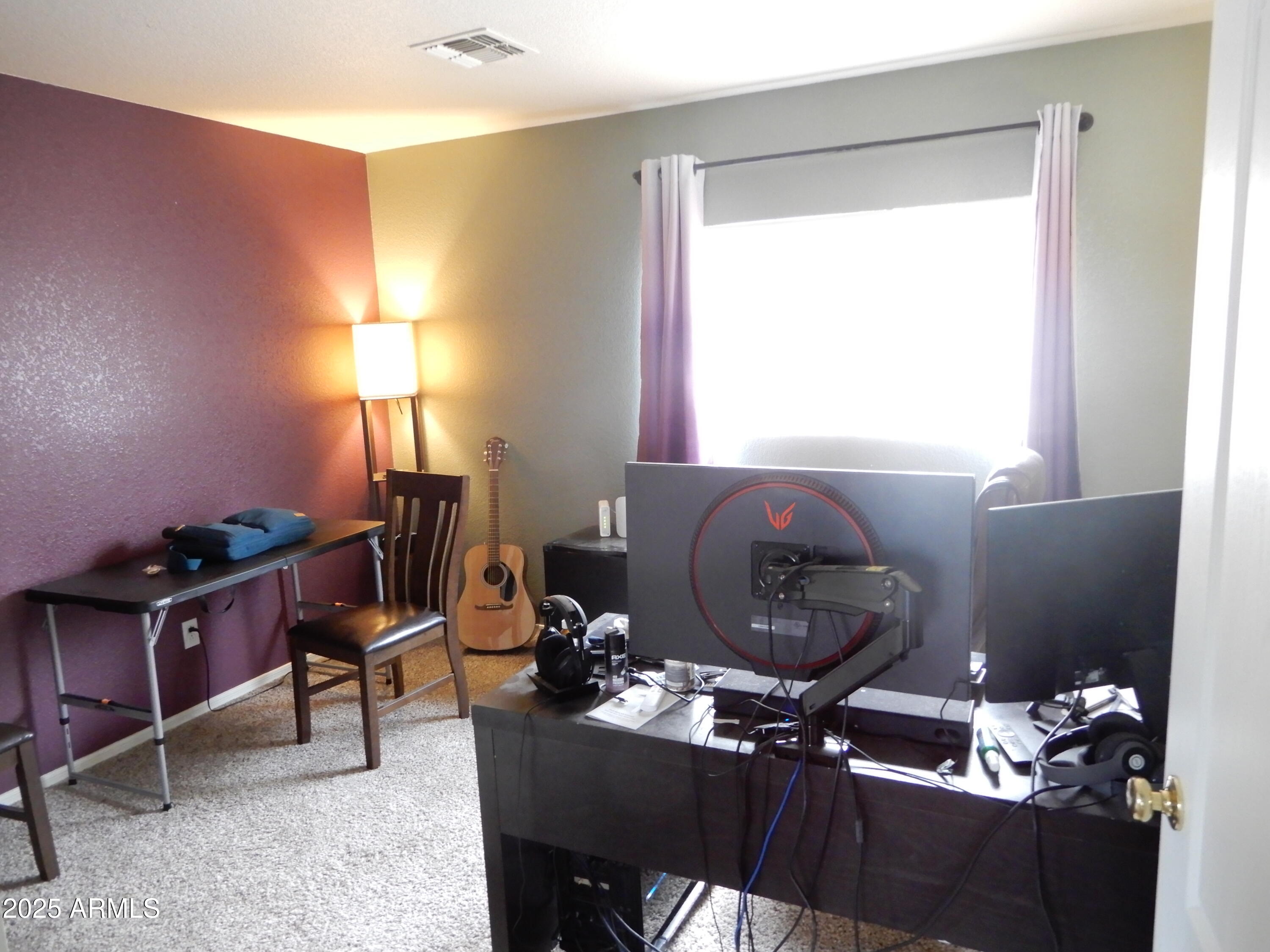 3436 South Chaparral Road Apache Junction, AZ 85119 - Photo 10 of 28 a work room with furniture and a window