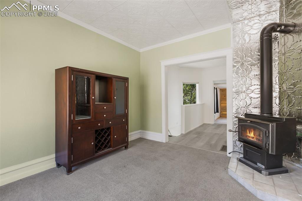 210 7th Street Victor, CO 80860 - Photo 9 of 38 wooden floor and window in a room