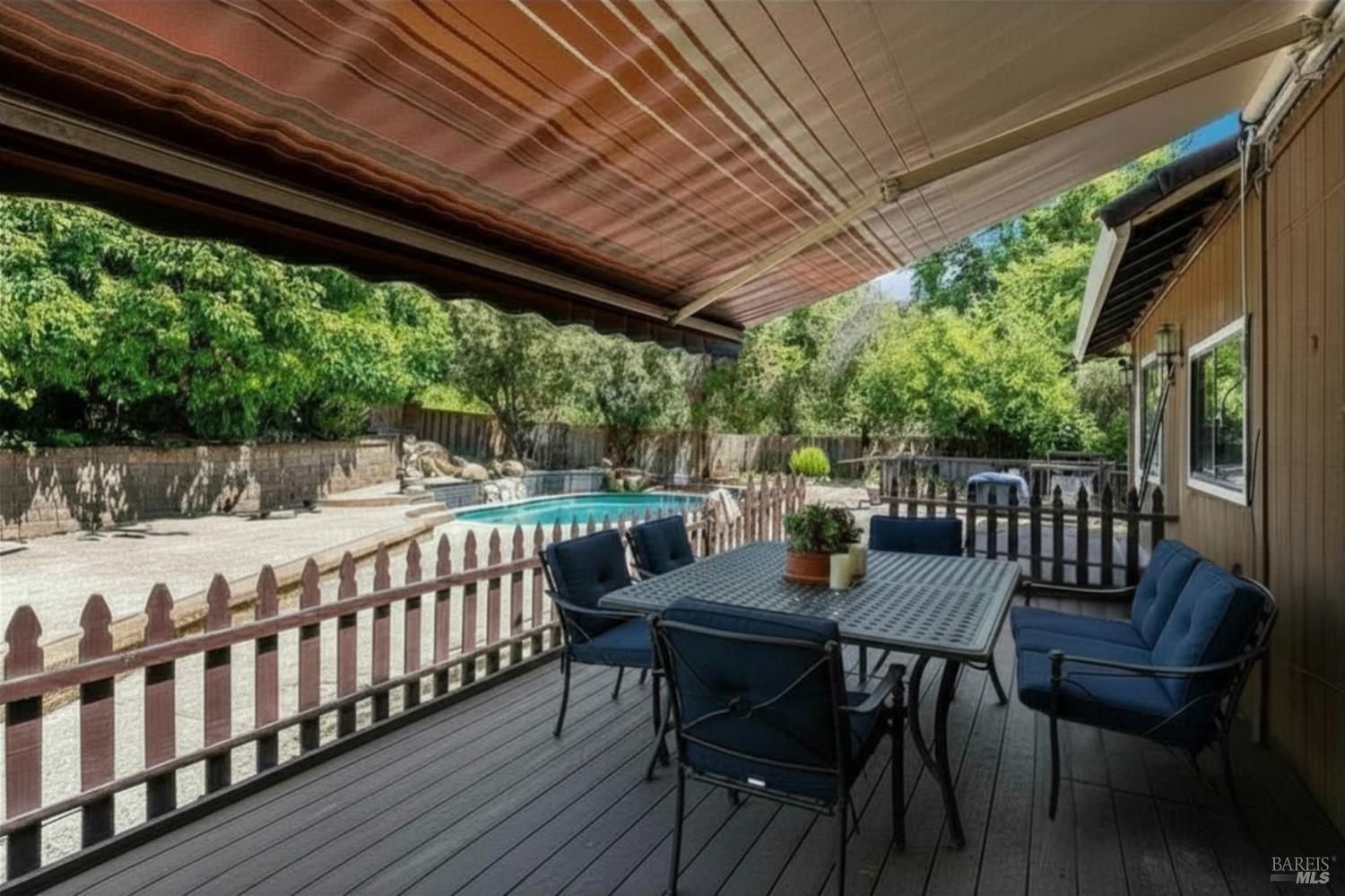 715 Placer Court Santa Rosa, CA 95401 - Photo 4 of 37 a view of porch with a table and chairs