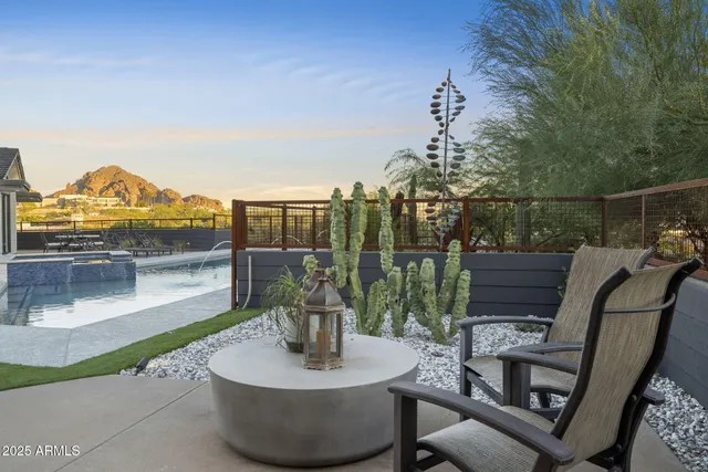 a view of a outdoor sitting area with furniture