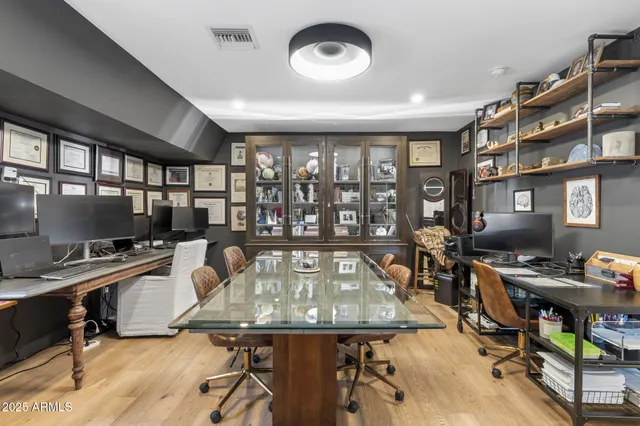 a view of a workspace with furniture