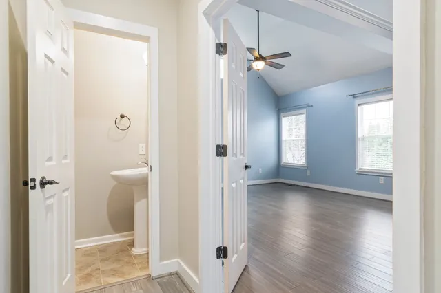 a view of a bathroom with a shower and a bathroom