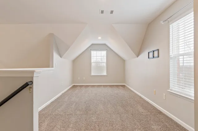 an empty room with a bathroom