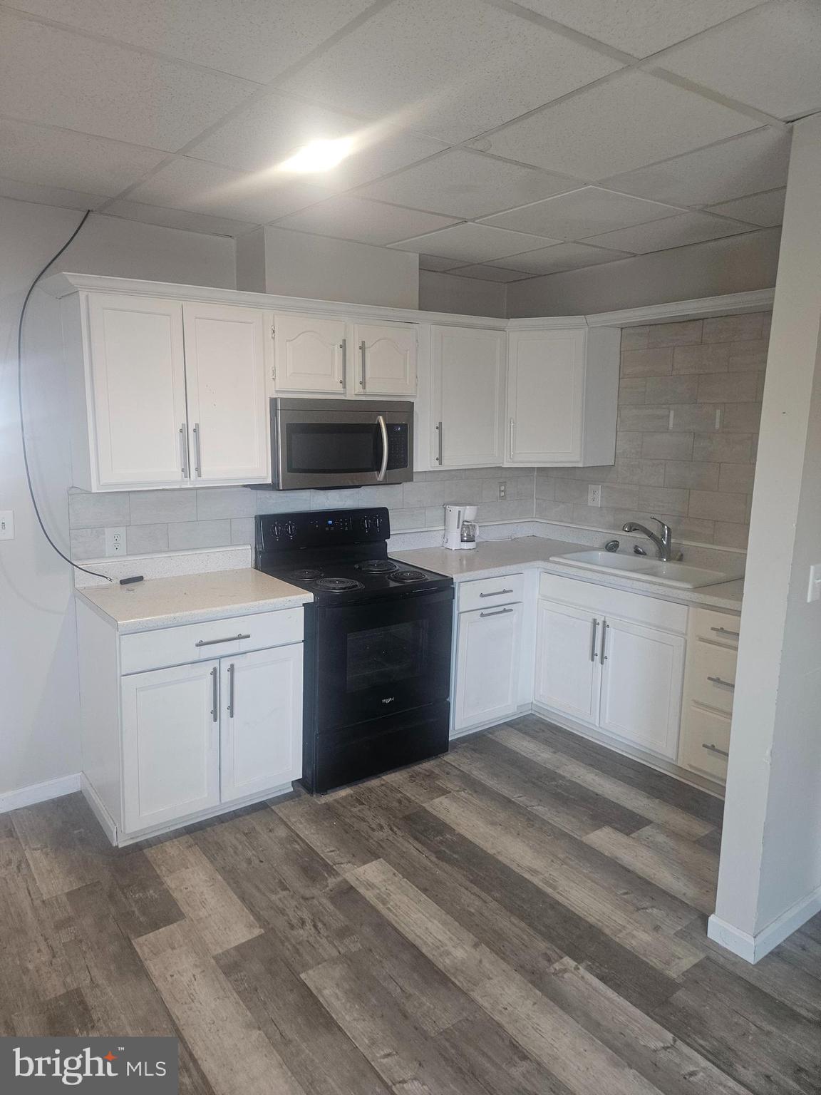 170 Valley Street Lewistown, PA 17044 - Photo 19 of 40 a kitchen with a sink stove and cabinets