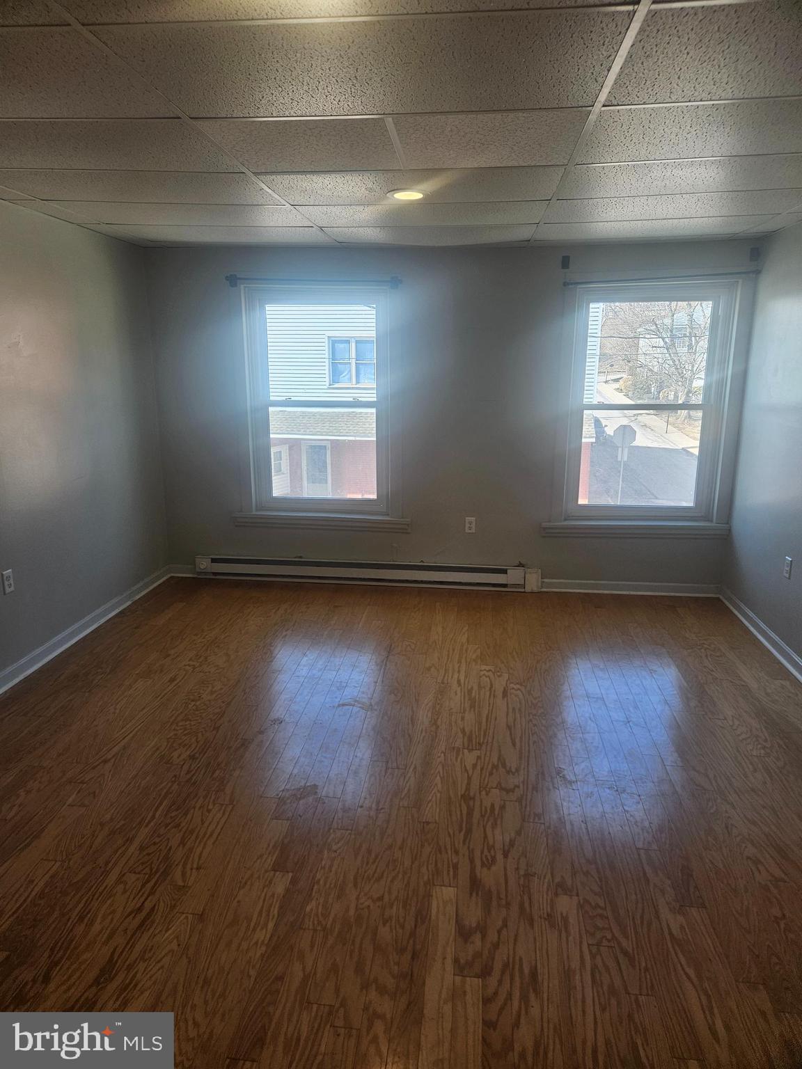 170 Valley Street Lewistown, PA 17044 - Photo 20 of 40 an empty room with wooden floor and windows