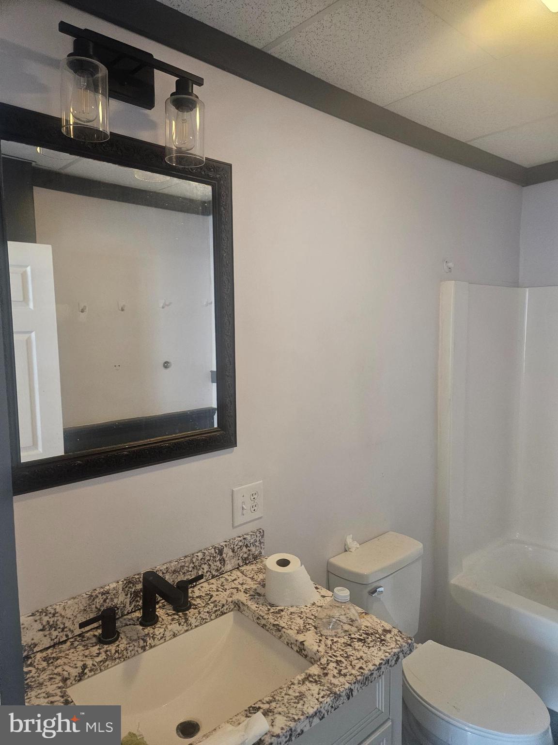 170 Valley Street Lewistown, PA 17044 - Photo 22 of 40 a bathroom with a sink toilet and mirror