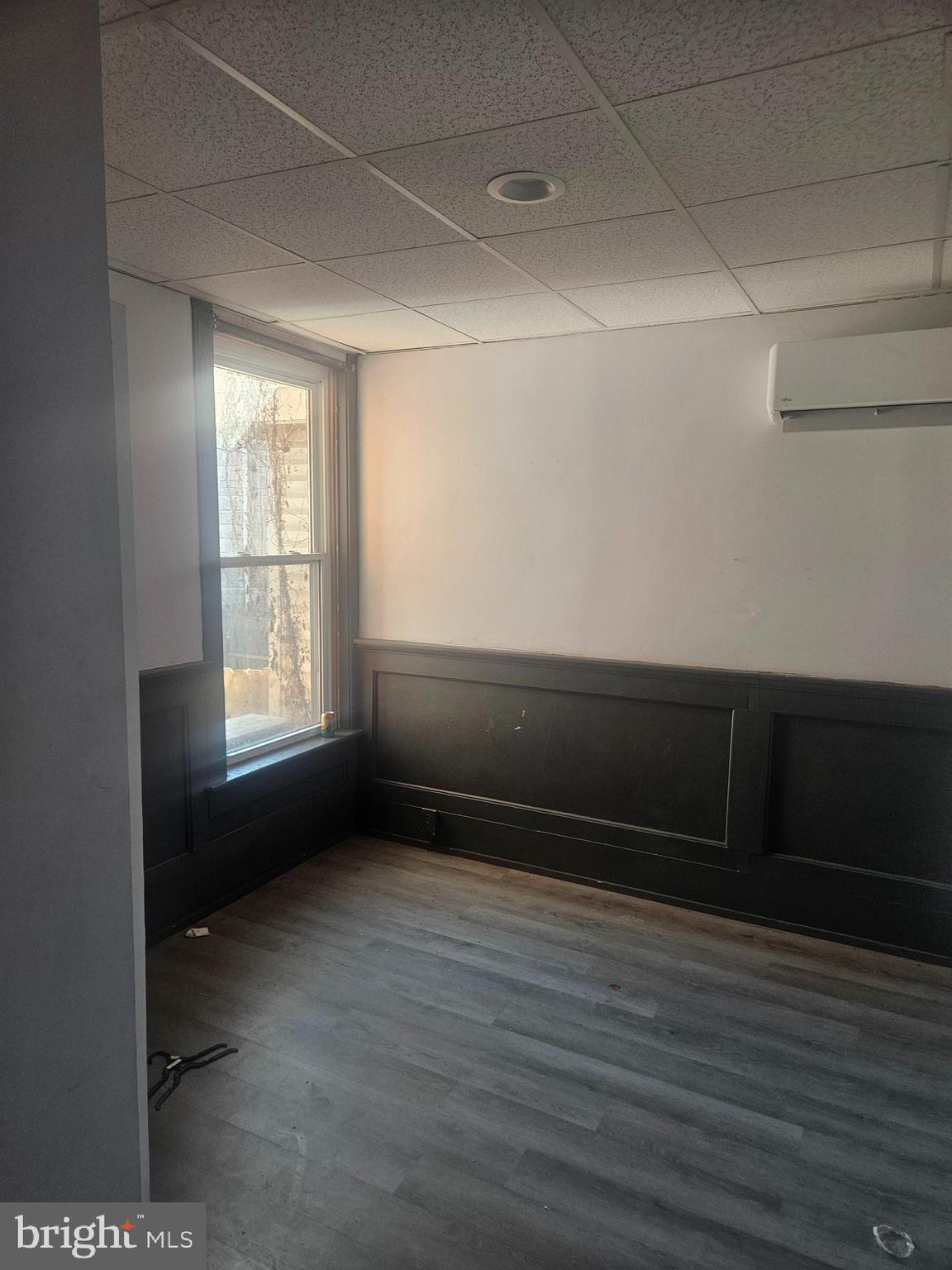 170 Valley Street Lewistown, PA 17044 - Photo 25 of 40 a view of an empty room with wooden floor and a window