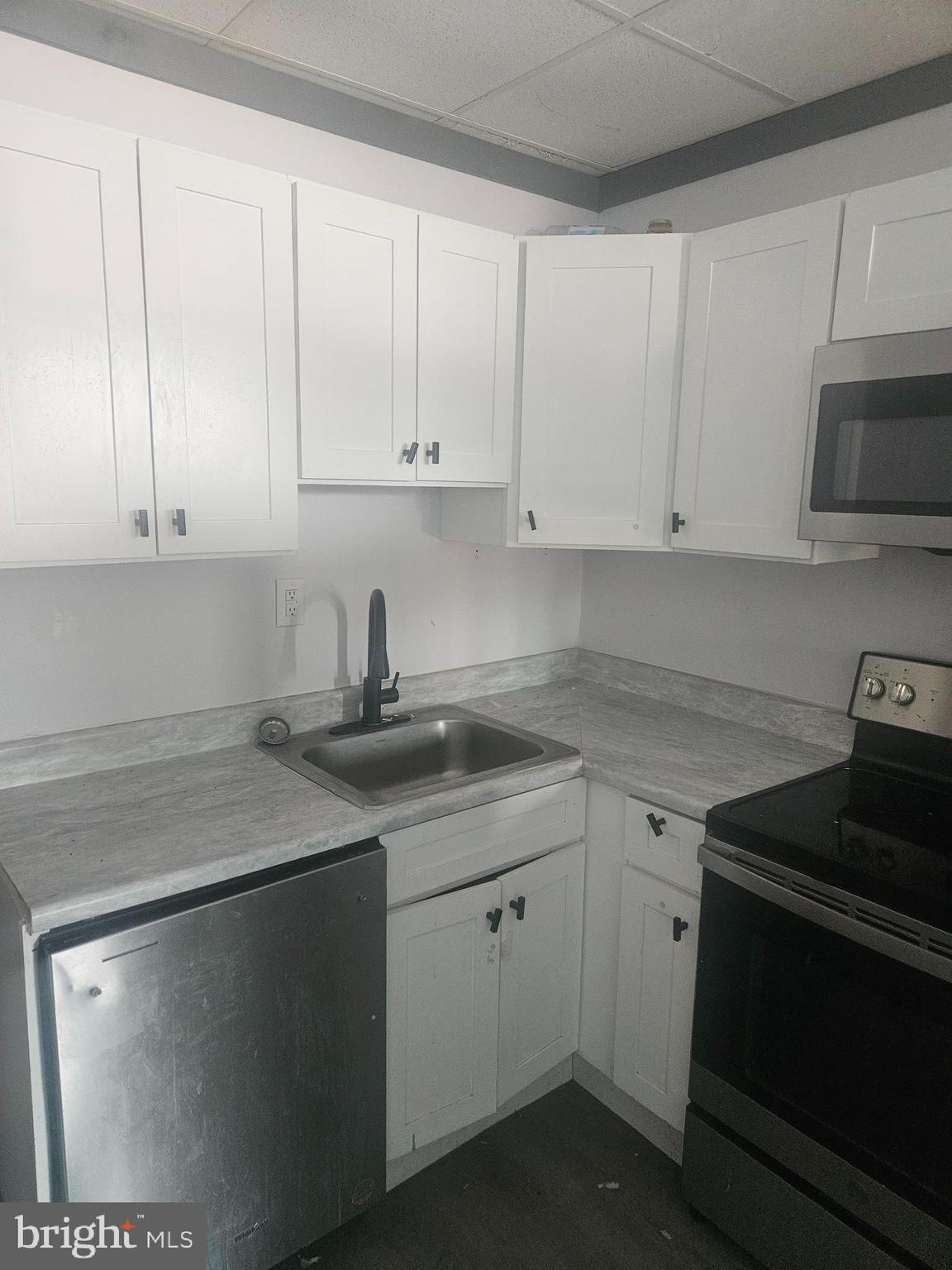 170 Valley Street Lewistown, PA 17044 - Photo 26 of 40 a kitchen with a sink and cabinets