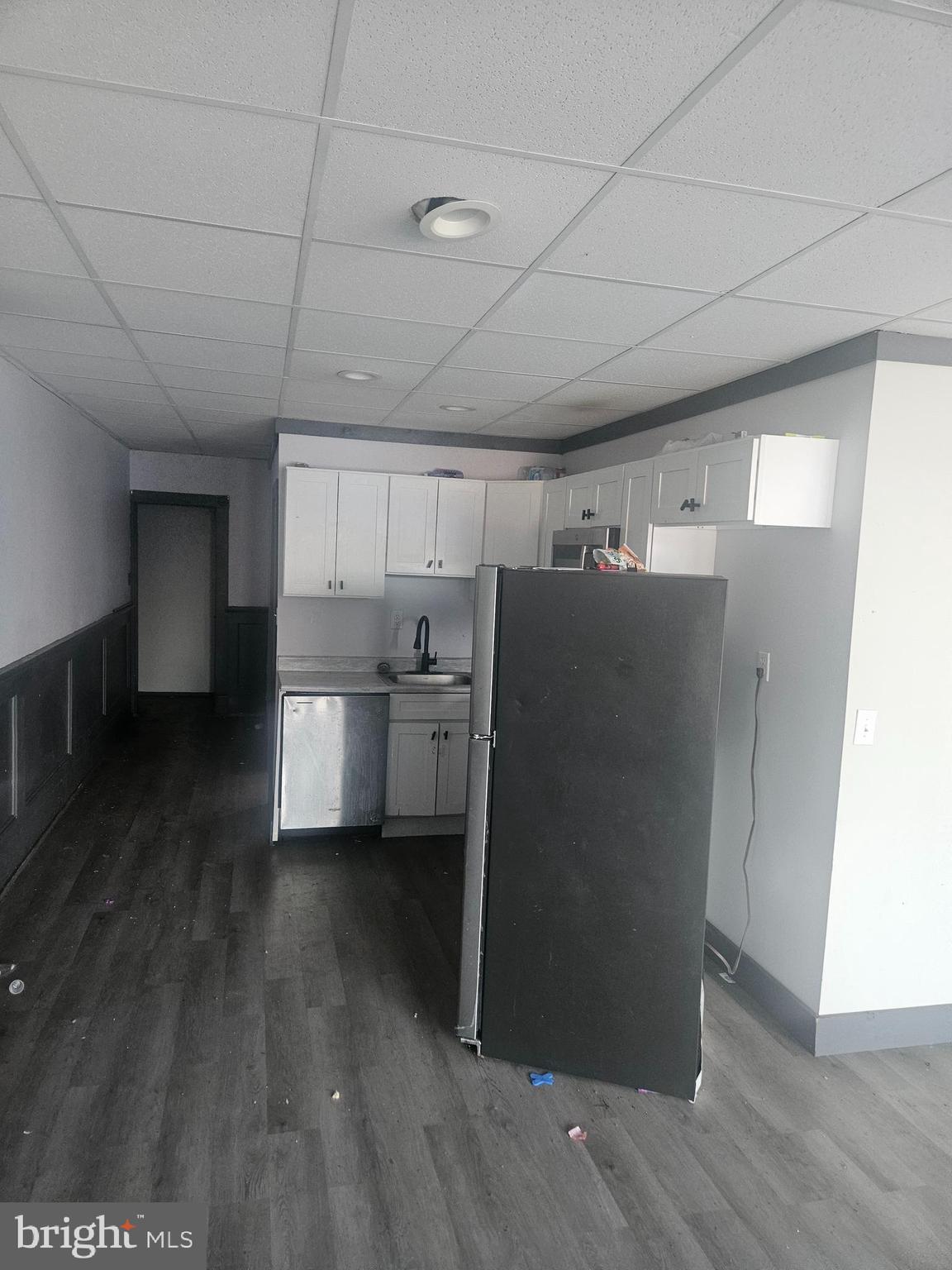 170 Valley Street Lewistown, PA 17044 - Photo 29 of 40 a kitchen with refrigerator and wooden floor