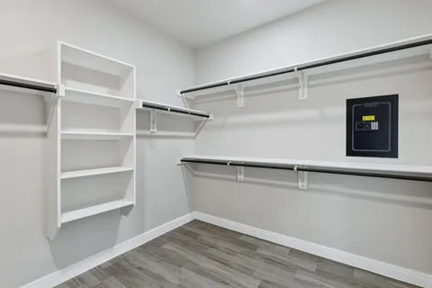 a view of an empty walk in closet