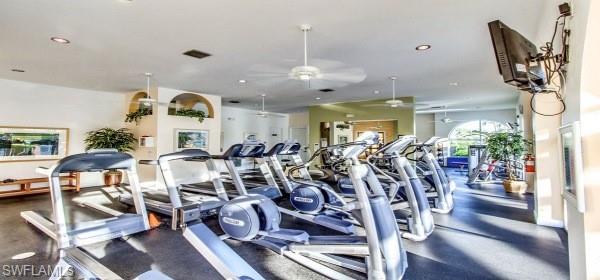 10274 Cape Roman Road, Unit 102 Estero, FL 34135 - Photo 33 of 36 a view of a room with gym equipment