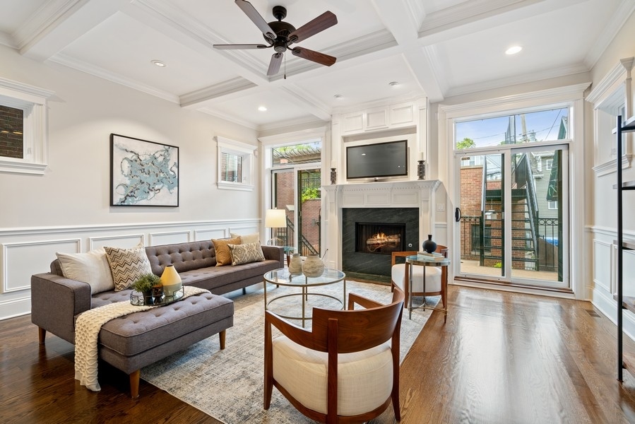 1904 West Wolfram Street Chicago, IL 60657 - Photo 11 of 56 a living room with furniture and a fireplace