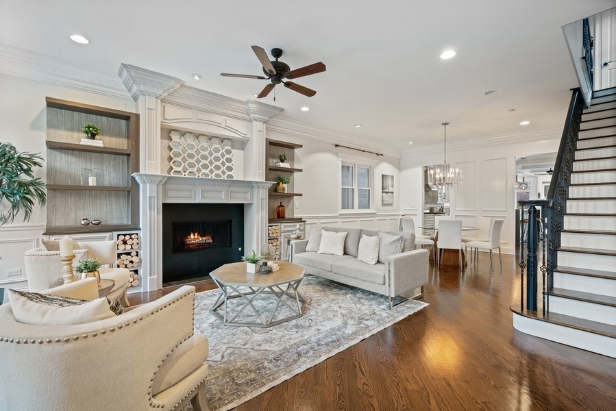 1904 West Wolfram Street Chicago, IL 60657 - Photo 3 of 56 a living room with furniture and a fireplace
