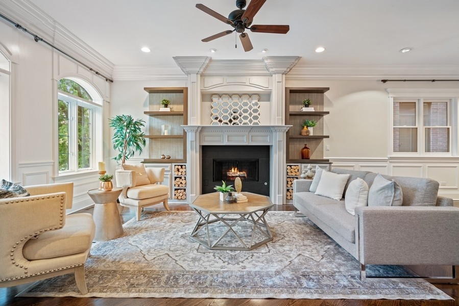 1904 West Wolfram Street Chicago, IL 60657 - Photo 4 of 56 a living room with furniture and a fireplace