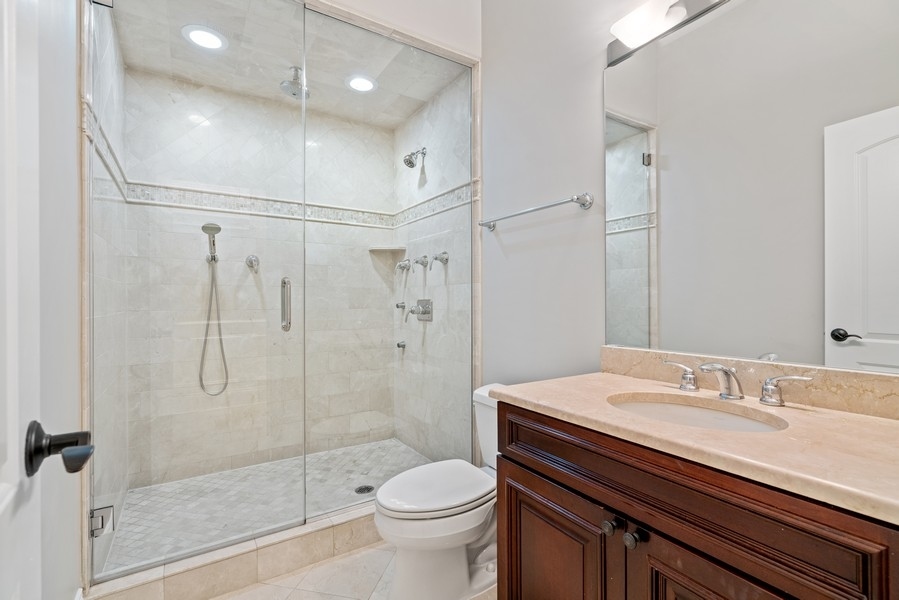 1904 West Wolfram Street Chicago, IL 60657 - Photo 46 of 56 a bathroom with a sink toilet and shower