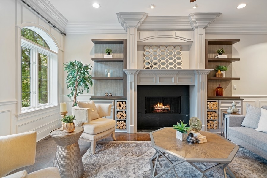 1904 West Wolfram Street Chicago, IL 60657 - Photo 7 of 56 a living room with furniture and a fireplace