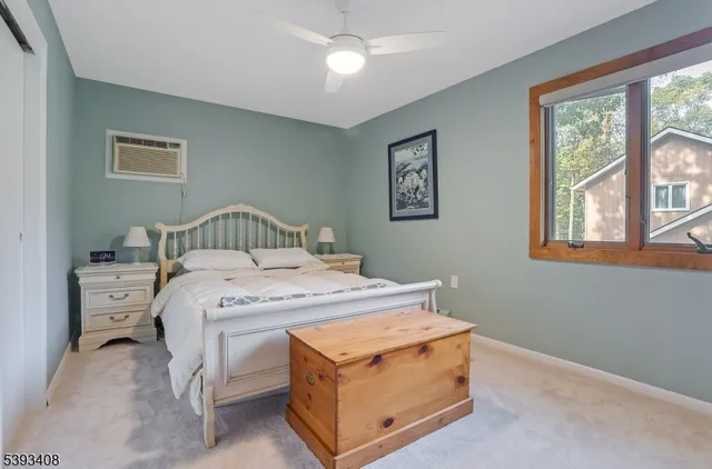 a room with a bed and a window