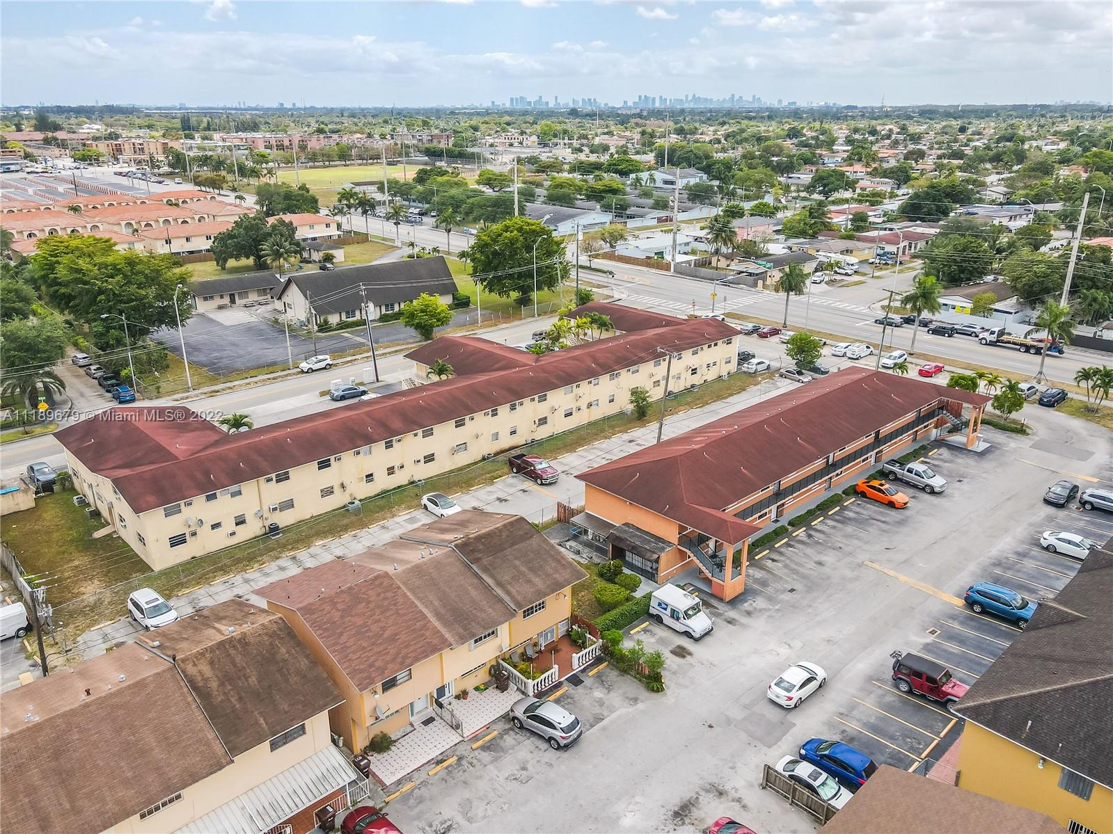 627 West 68th Street, Unit 627 Hialeah, FL 33014 - Photo 12 of 31 an aerial view of a city